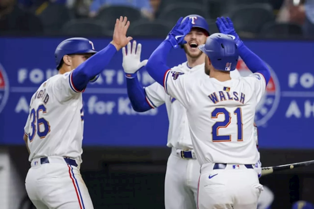 Jared Walsh homers after watching new teammates get World Series rings as Rangers beat Cubs 11-2