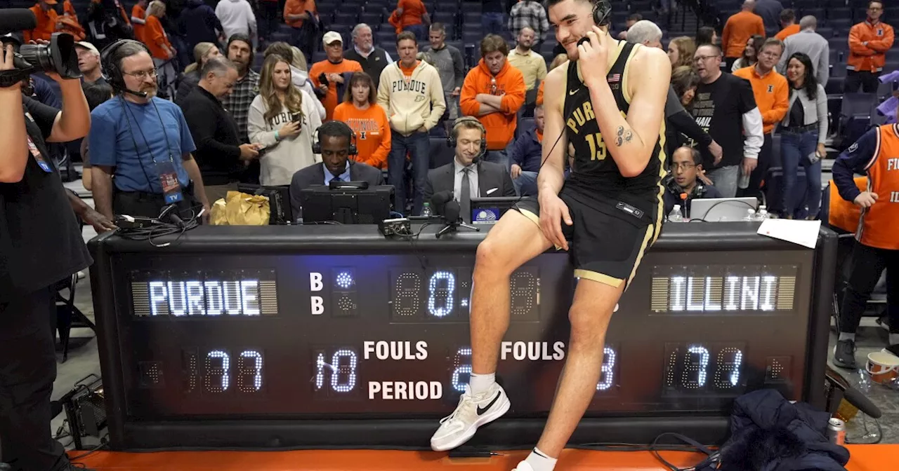 Edey helps rally No. 3 Purdue to 77-71 win at No. 12 Illinois to clinch outright Big Ten title