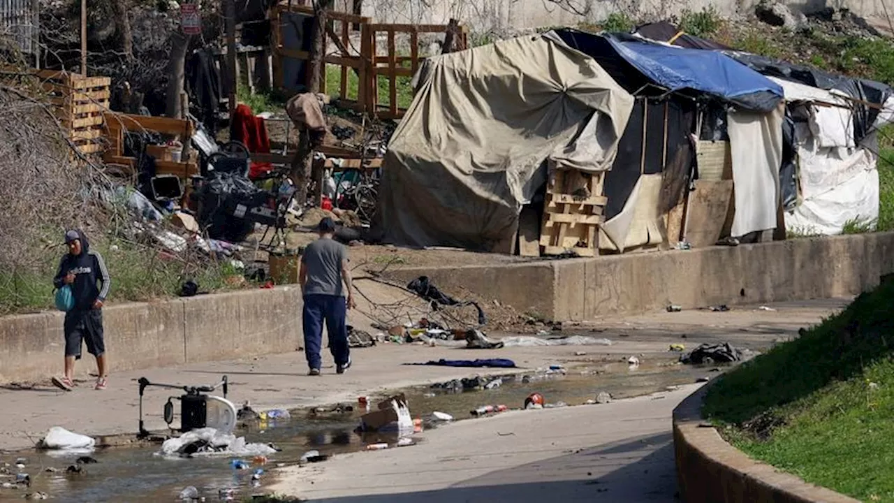 Dallas homeless camps’ trash damages Trinity River’s Elm Fork