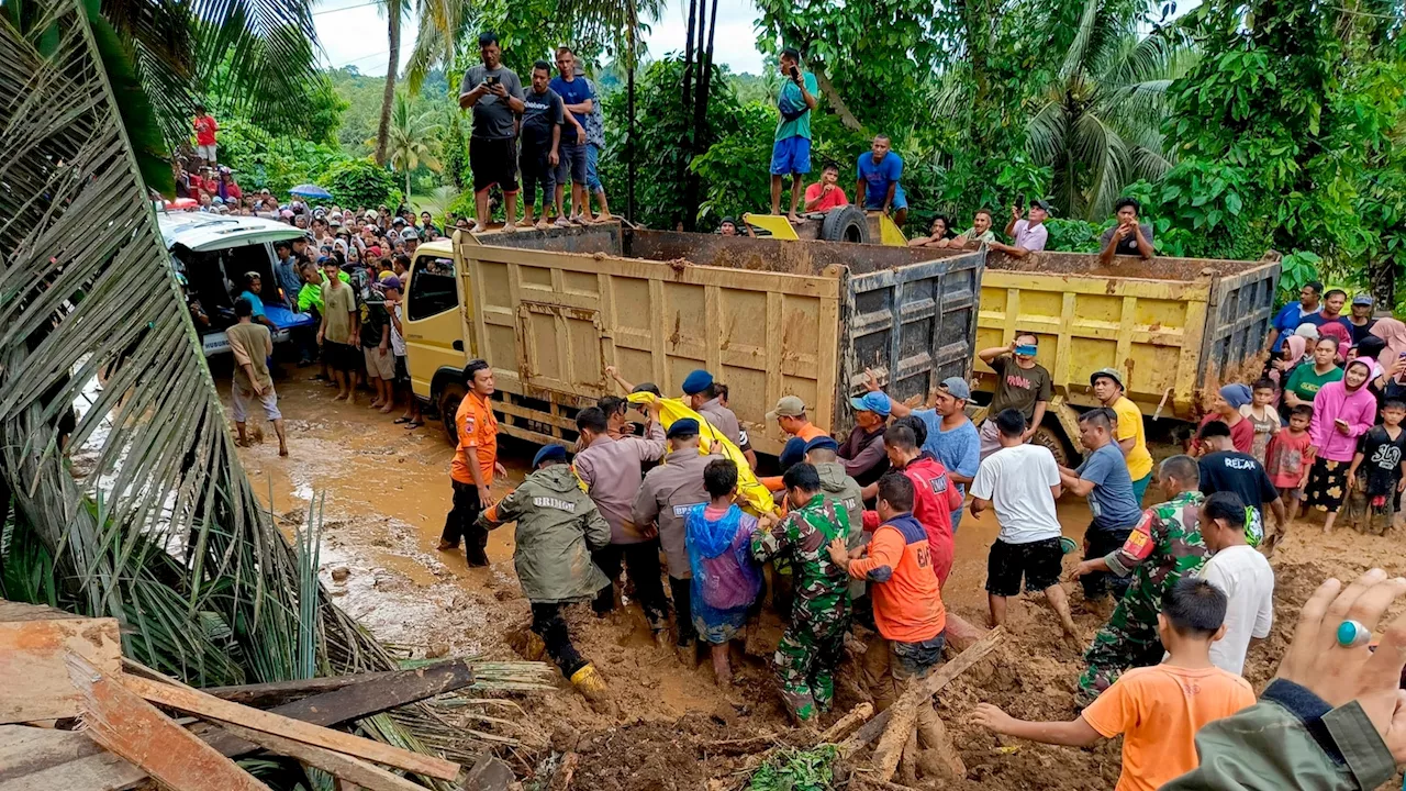 At least 10 dead and 10 missing as landslide and flash floods hit Indonesia