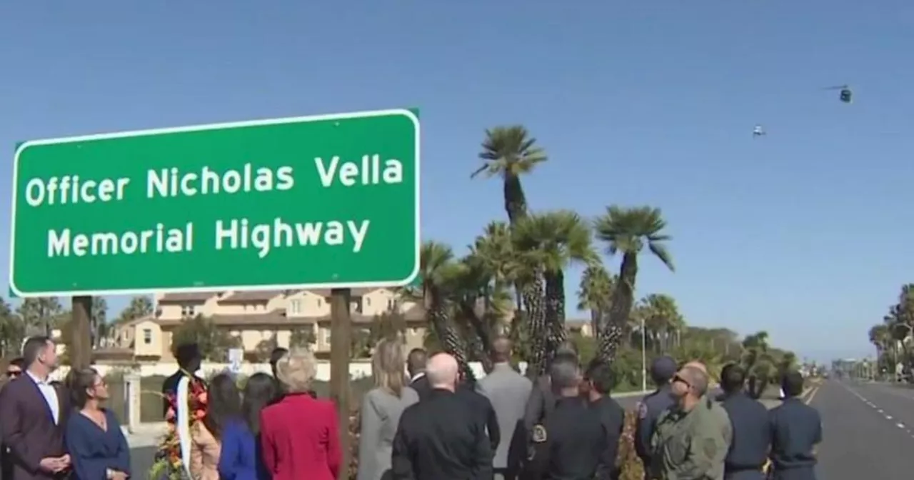 Highway memorial sign dedicated to fallen Huntington Beach Police Officer Nicholas Vella