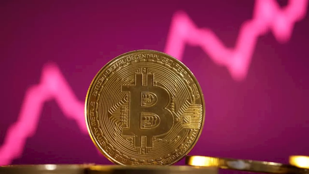 Bitcoin breaks $70,000 in volatile trading, hitting a new record to end the week