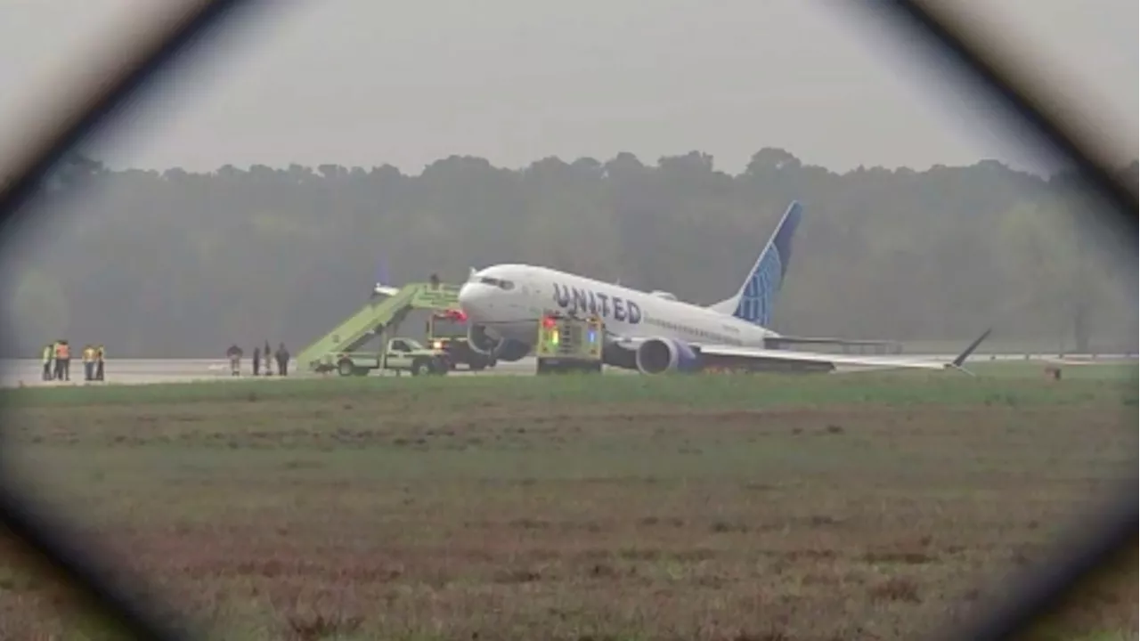 United Airlines plane rolls off runway in Houston