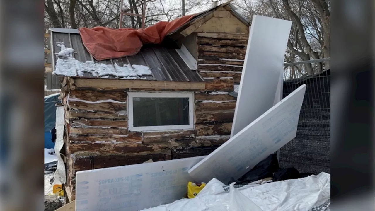 Kingston, Ont. firefighters remove wood cabin from encampment due to alleged fire risk