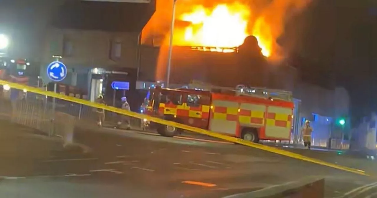 Huge fire rips through flats in Falkirk as emergency services race to scene