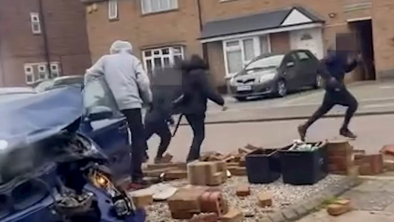 Shocking moment car 'full of schoolchildren' rams into brick wall