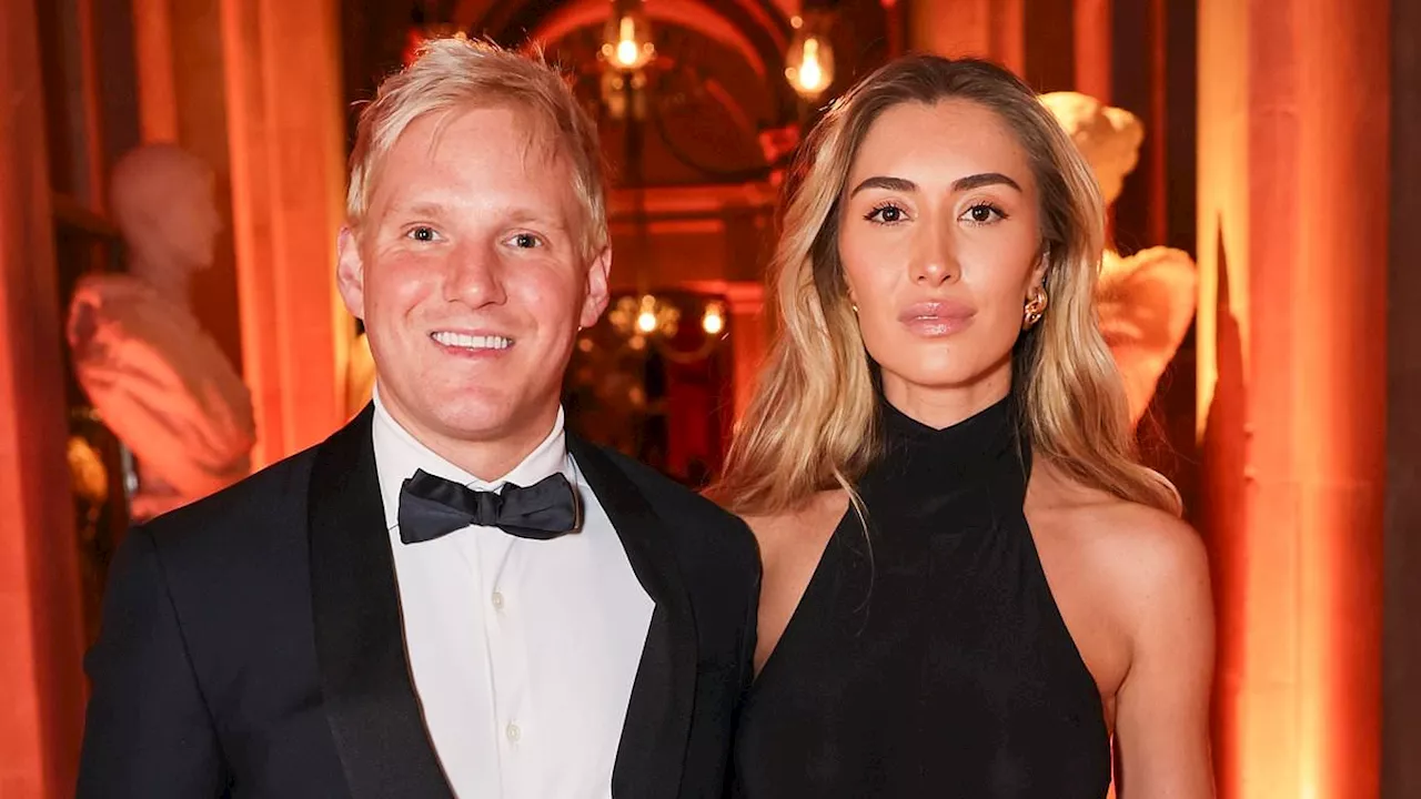 Sophie Habboo exudes glamour in dramatic fishtail gown as she and husband Jamie Laing attend...