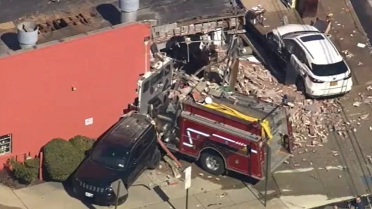 Fire truck slams into Long Island building, causing collapse