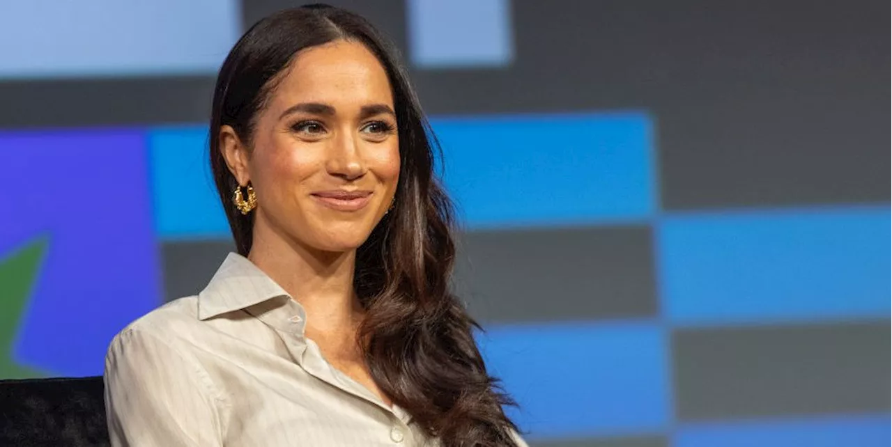 Duchess Meghan Wears a Silky Pinstripe Set for Keynote Address at SXSW