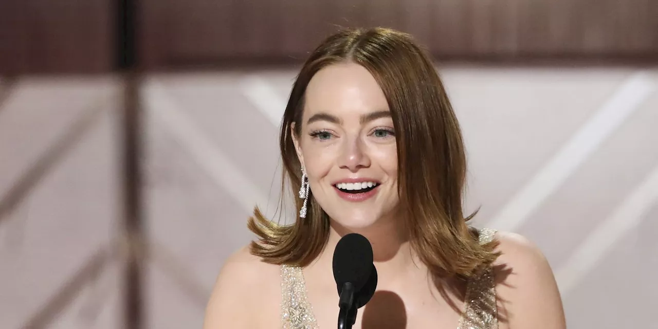 Emma Stone Elegantly Styled a Gold Bra Top with a Matching Skirt and Blazer