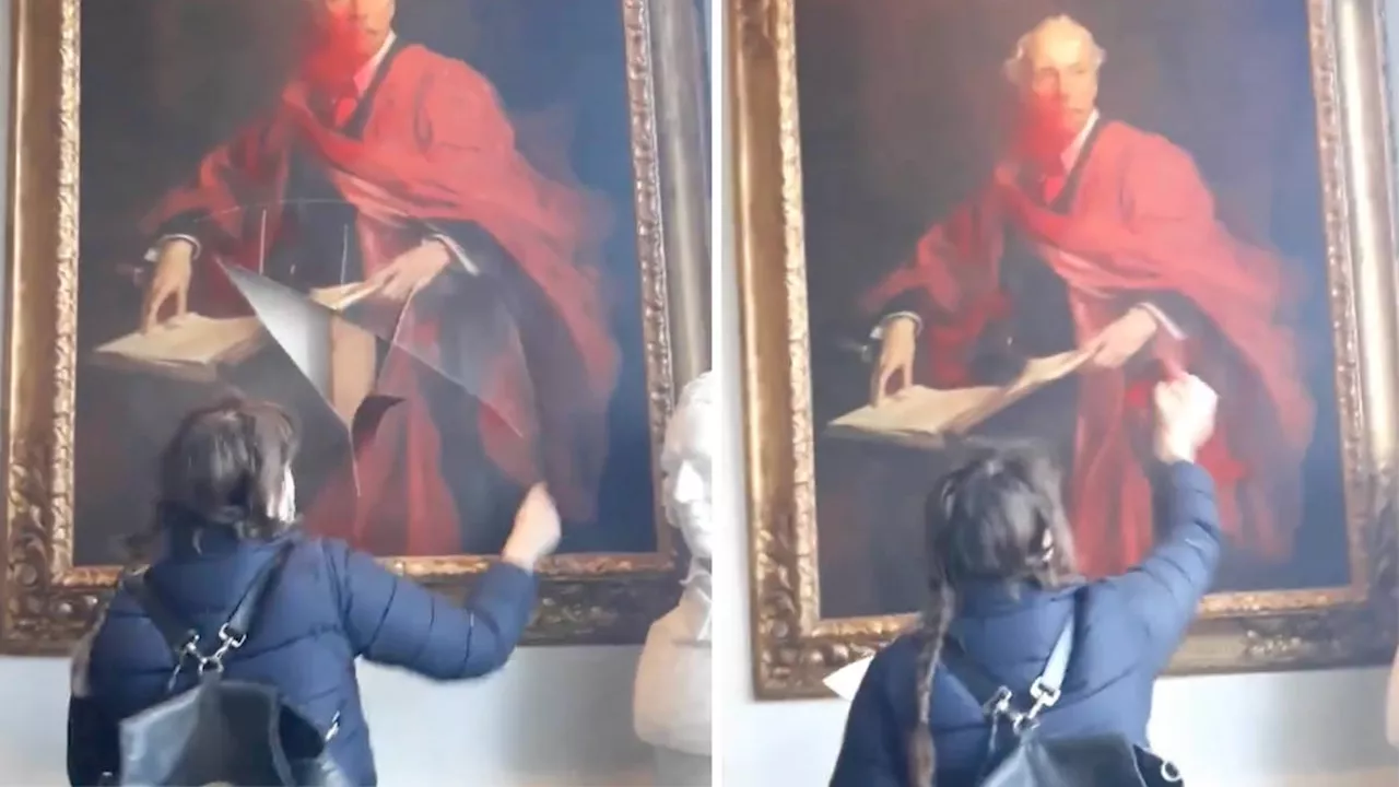 Palestine protester slashes painting of former PM Arthur Balfour at Cambridge college in 'moronic act of...