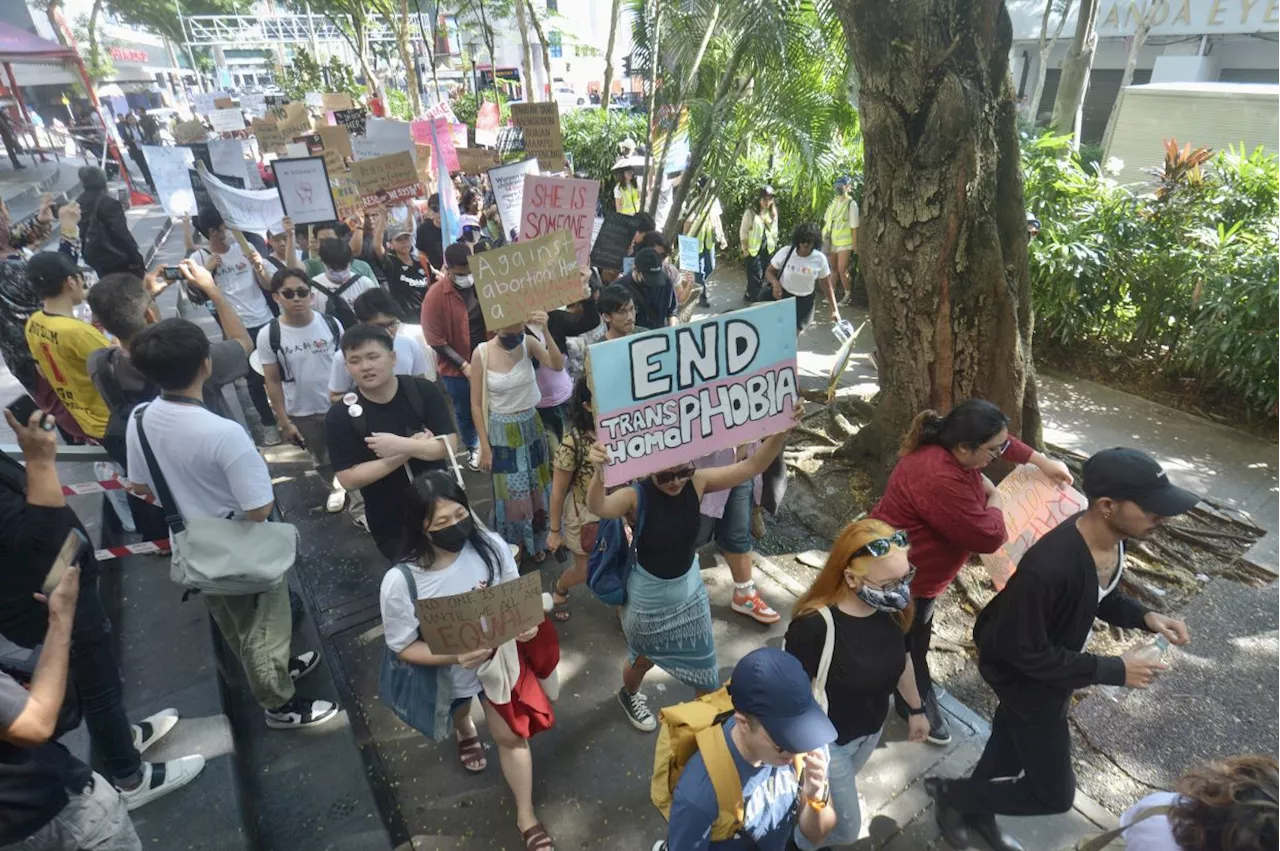 Crowd marches for gender equality during Women's March 2024 in KL