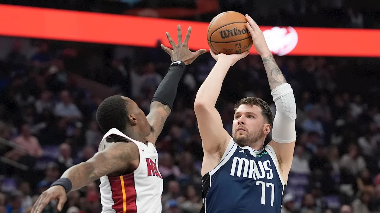 Doncic records fifth consecutive 30-point triple-double in Mavs' win over Heat