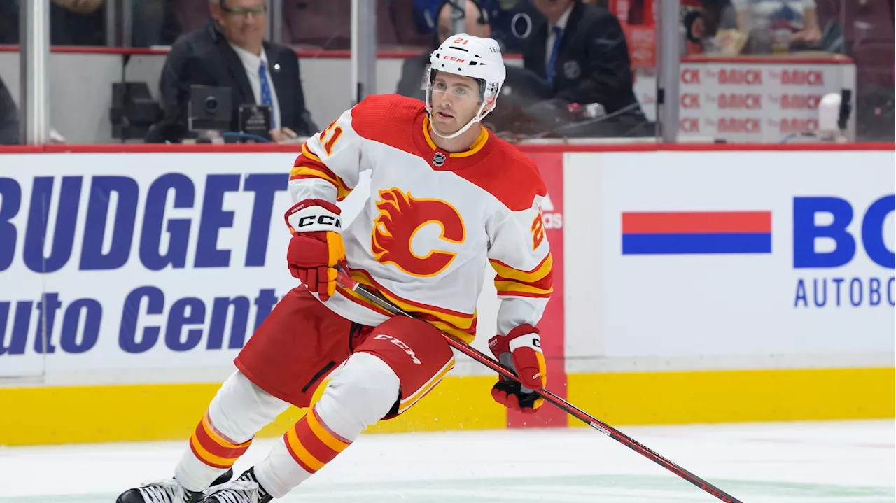 Flames extend Rooney, acquire Okhotiuk in deal with Sharks