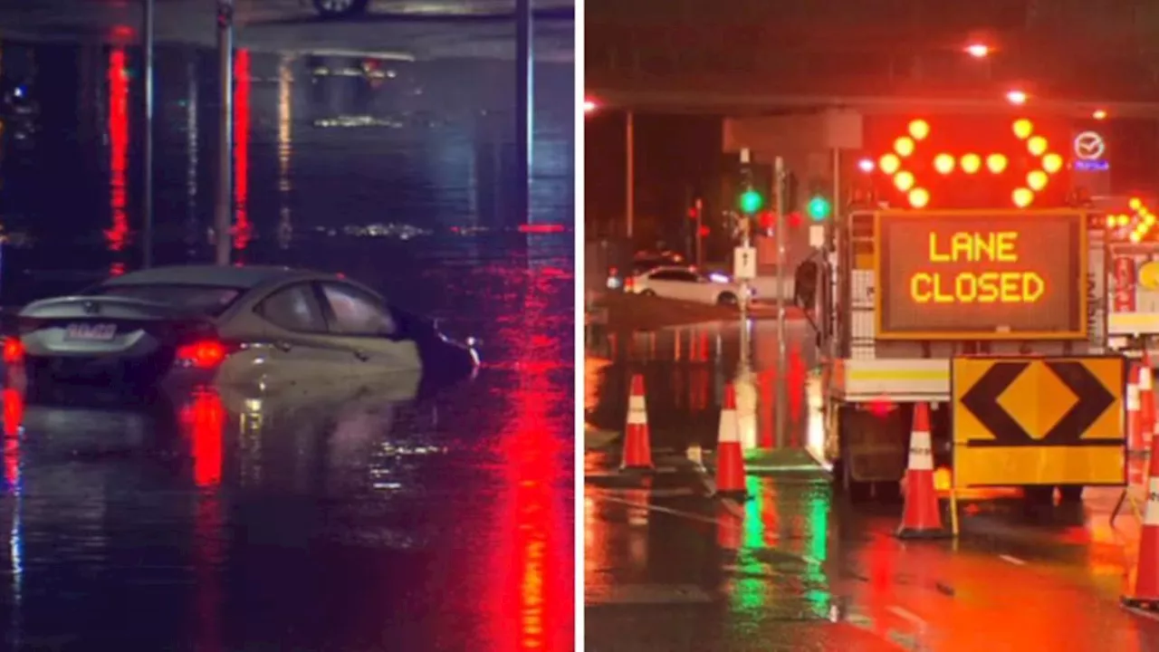 Cars stuck in floodwater and trees down as wild weather smashes Victoria