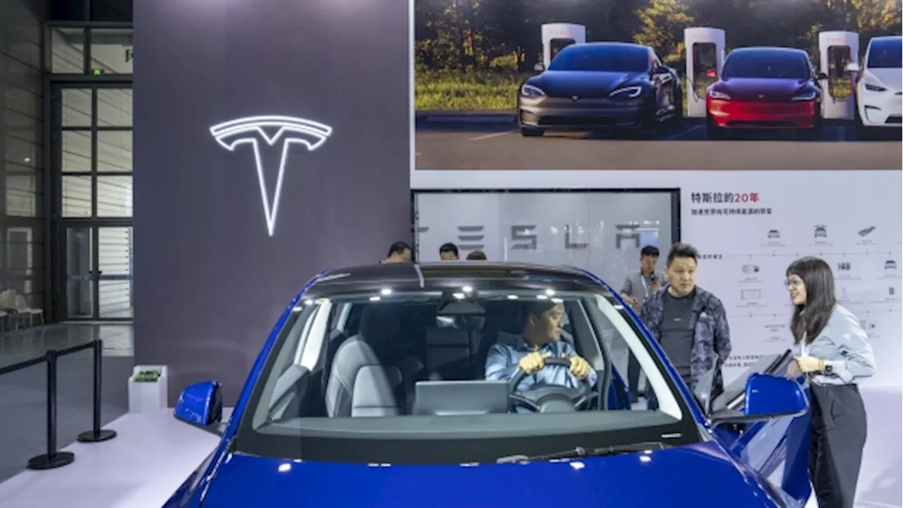 Tesla China Price Hike Meets Slew of Cuts From Other Carmakers