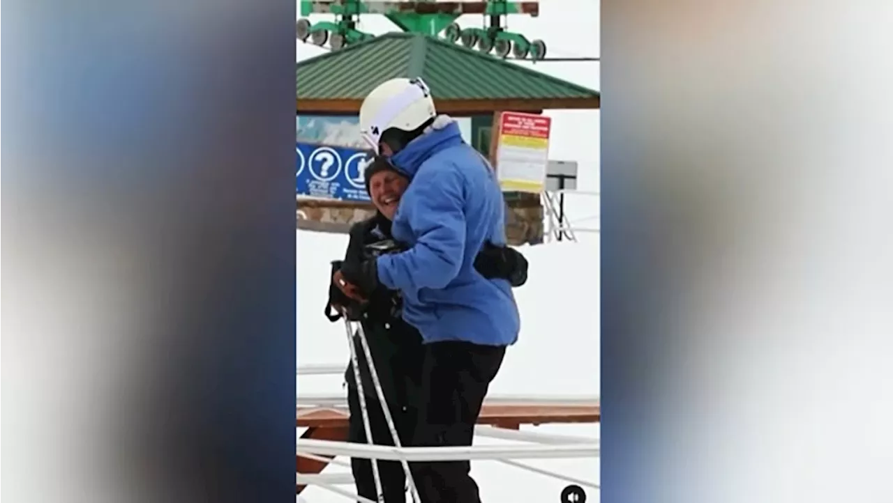 Castle Mountain Marie spreads a little love by handing out hugs to skiers