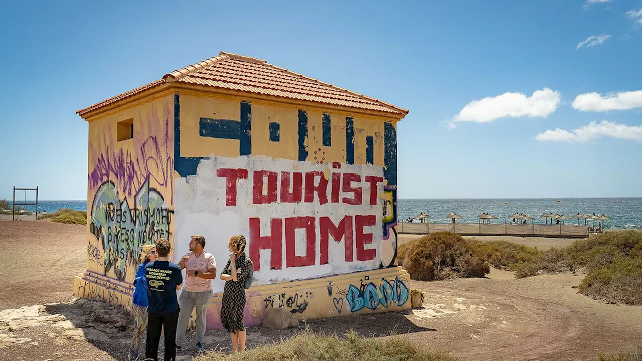 Holidaymaking Brits met with anti-tourist graffiti on Tenerife as frustrated locals claim they only...