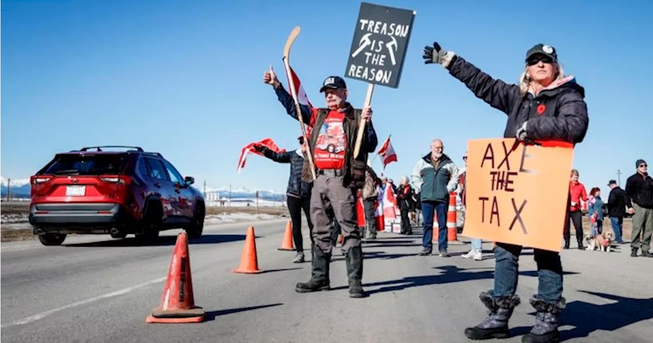 ‘It just needs to stop’: Carbon price protesters slow traffic on Trans-Canada Highway