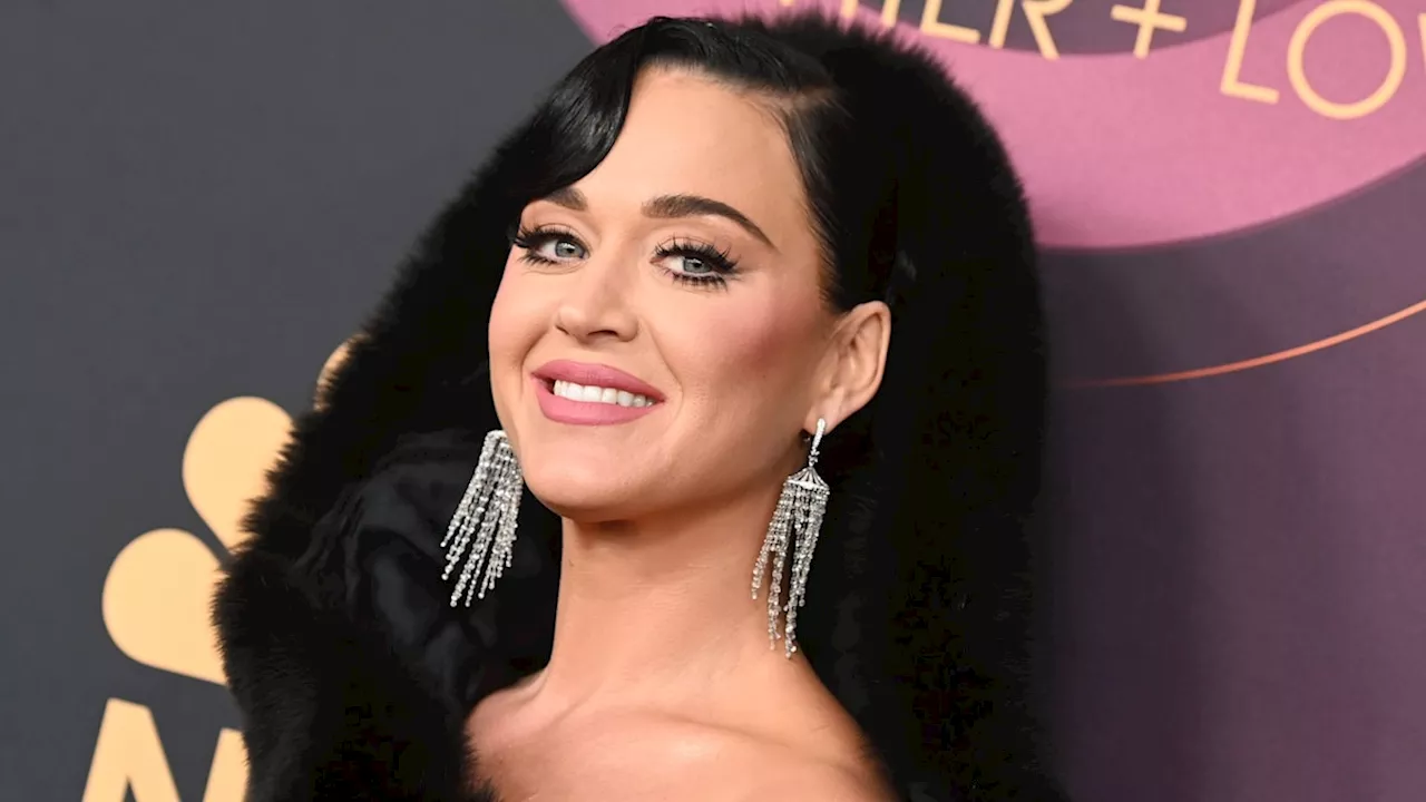 Katy Perry cosies up in knitted outfit with sky-high boots you need to see