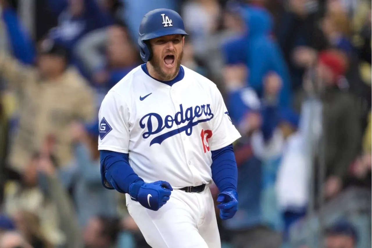 Max Muncy’s 2-run homer in the eighth rallies Dodgers past Cardinals