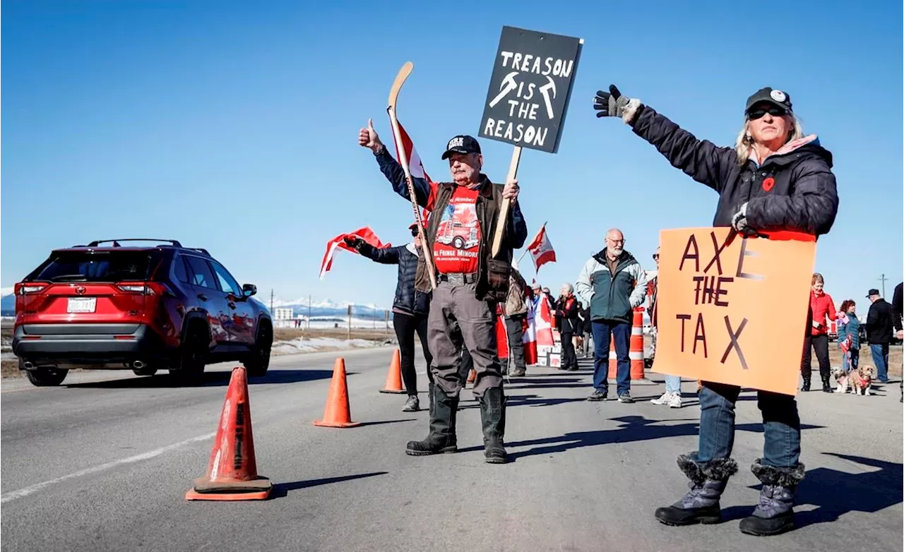 'It just needs to stop': Carbon price protesters slow traffic on Trans-Canada Highway