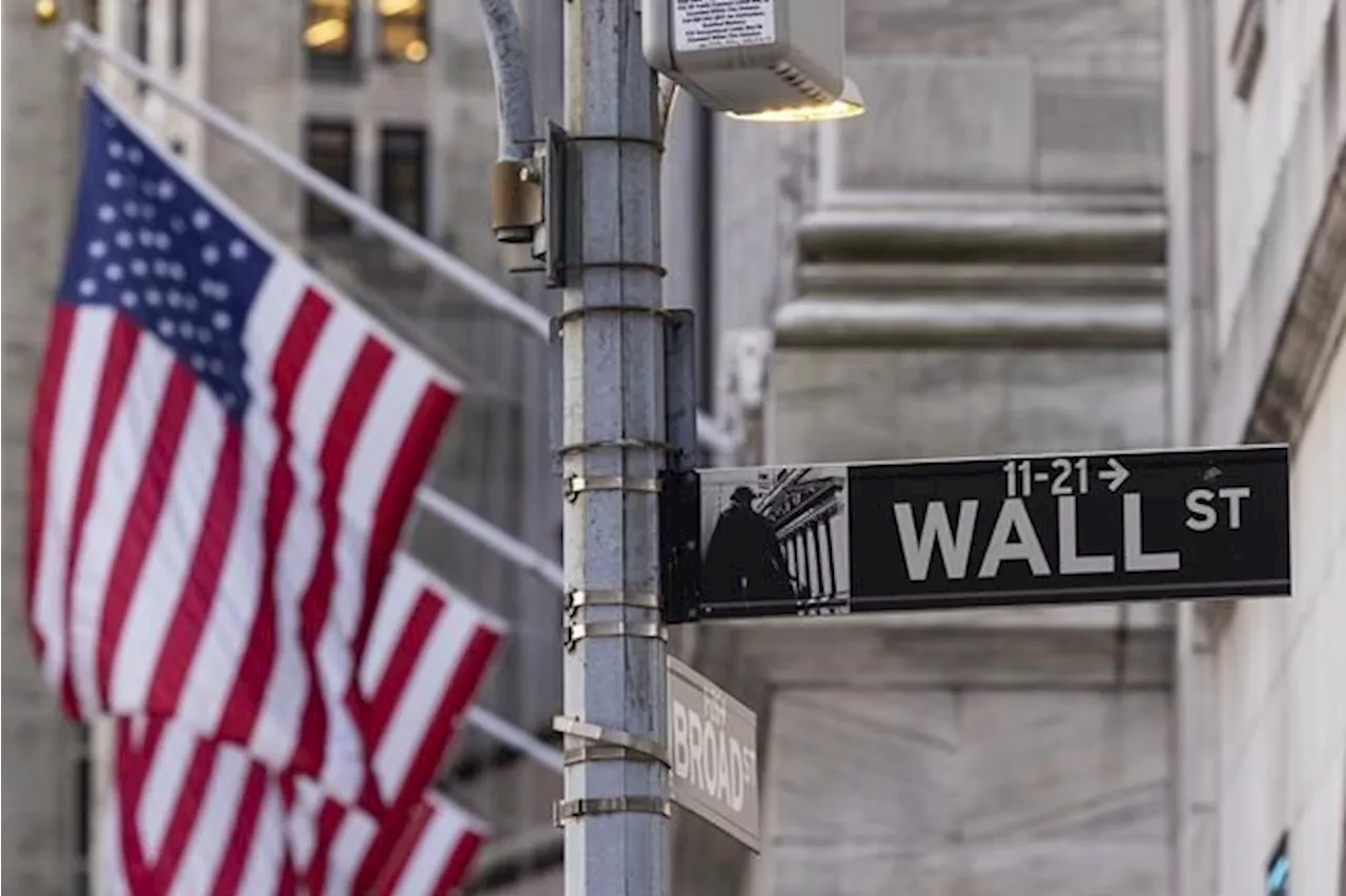 Stock market today: Wall Street hangs near record highs at the start of a busy week