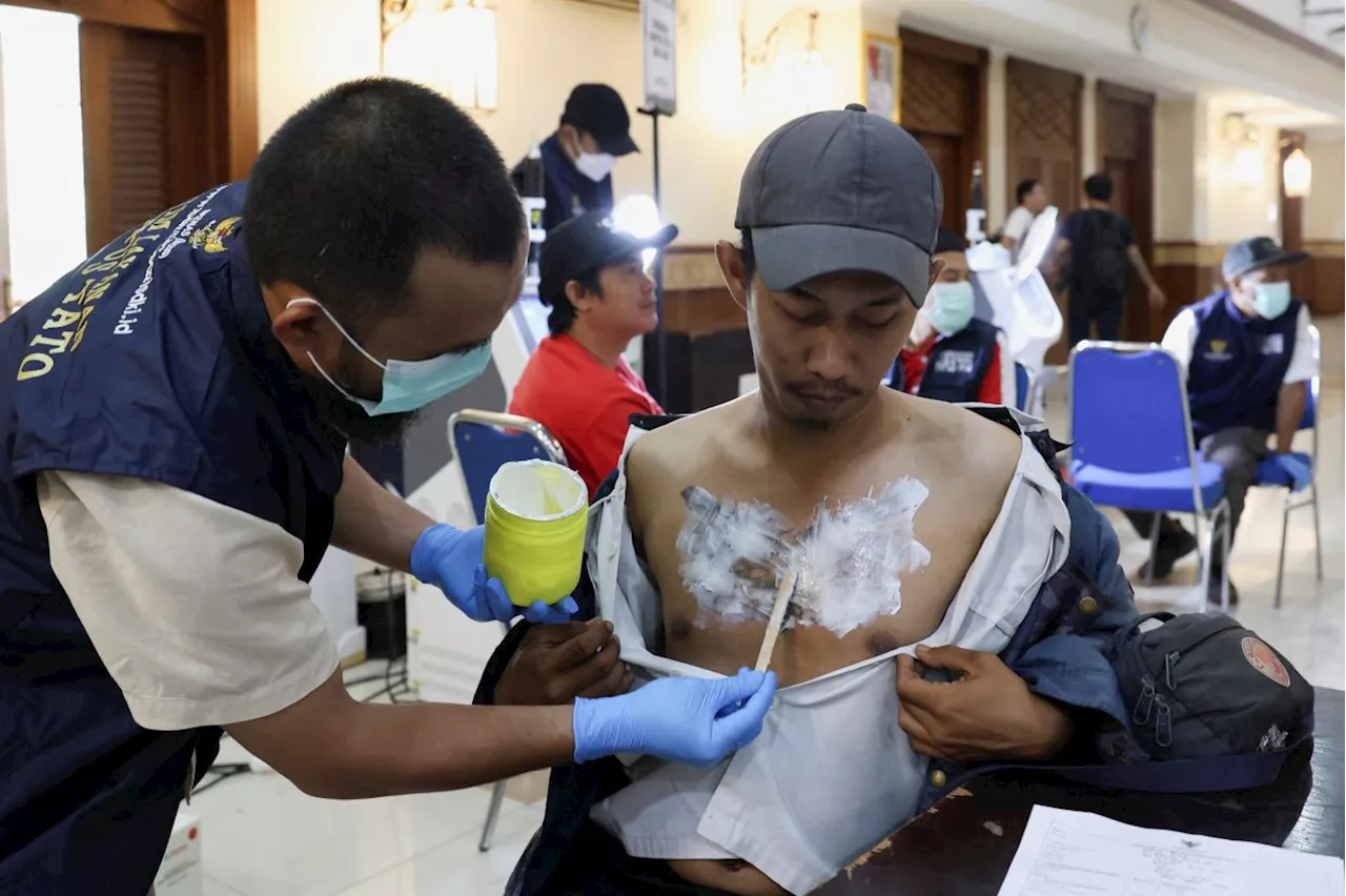 Indonesian Muslims sign up for tattoo removal 'to repent' during Ramadhan