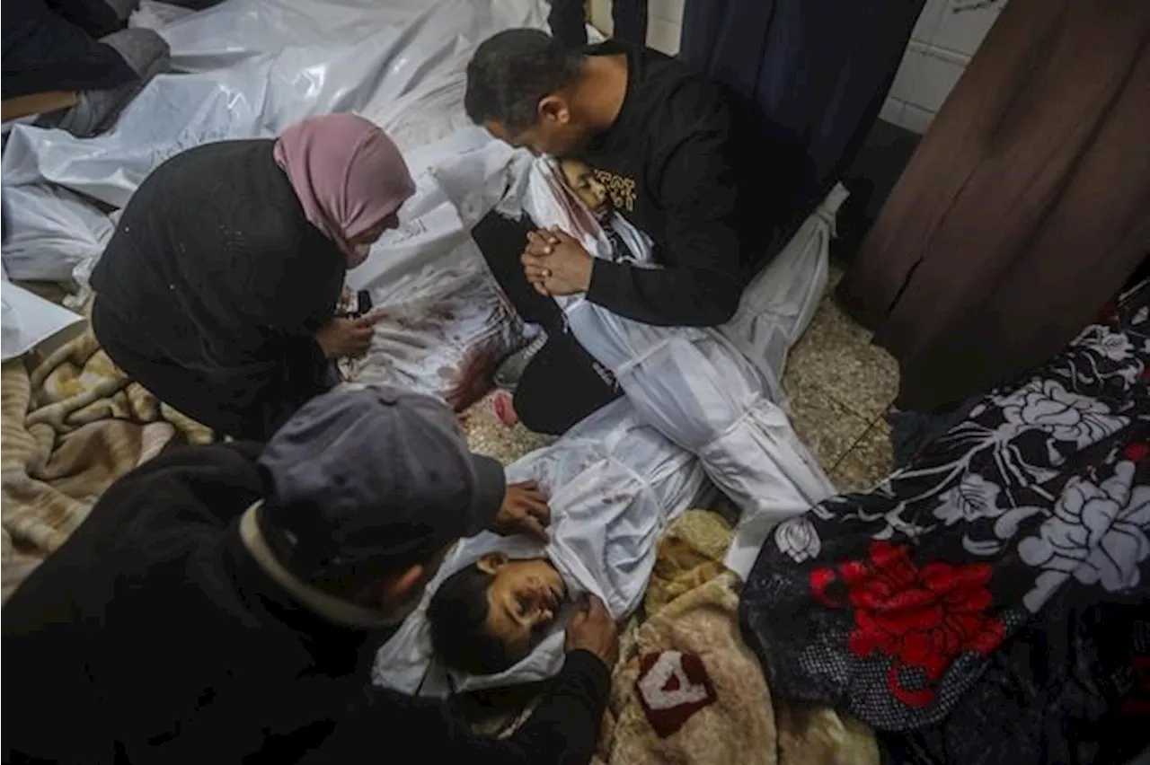 An Israeli airstrike in Gaza kills 3 sons and 4 grandchildren of Hamas' top leader