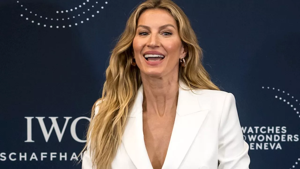 Gisele Bundchen goes topless beneath white pantsuit at Watches and Wonders event in Switzerland