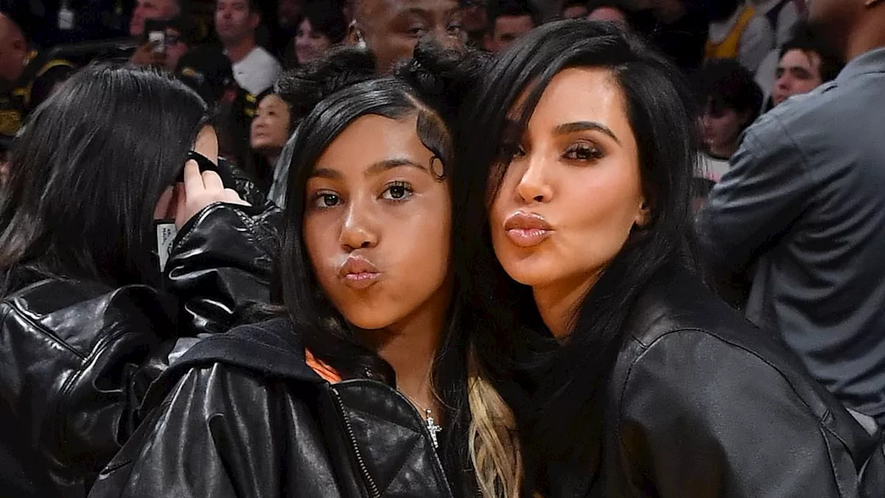 Kim Kardashian playfully pouts with North, 10, as the youngster follows in her mother's fashionable...