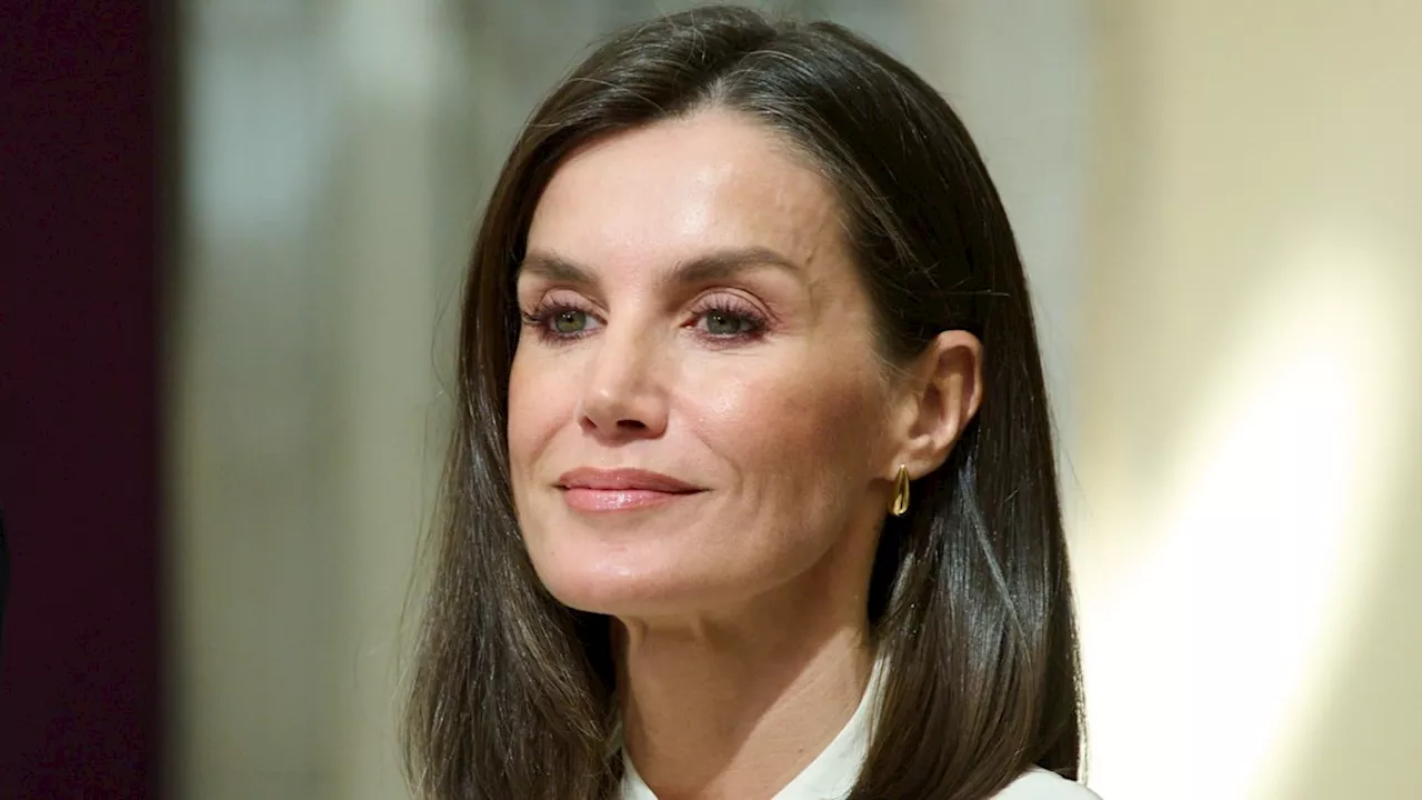 Queen Letizia epitomises class in designer look on sombre occasion