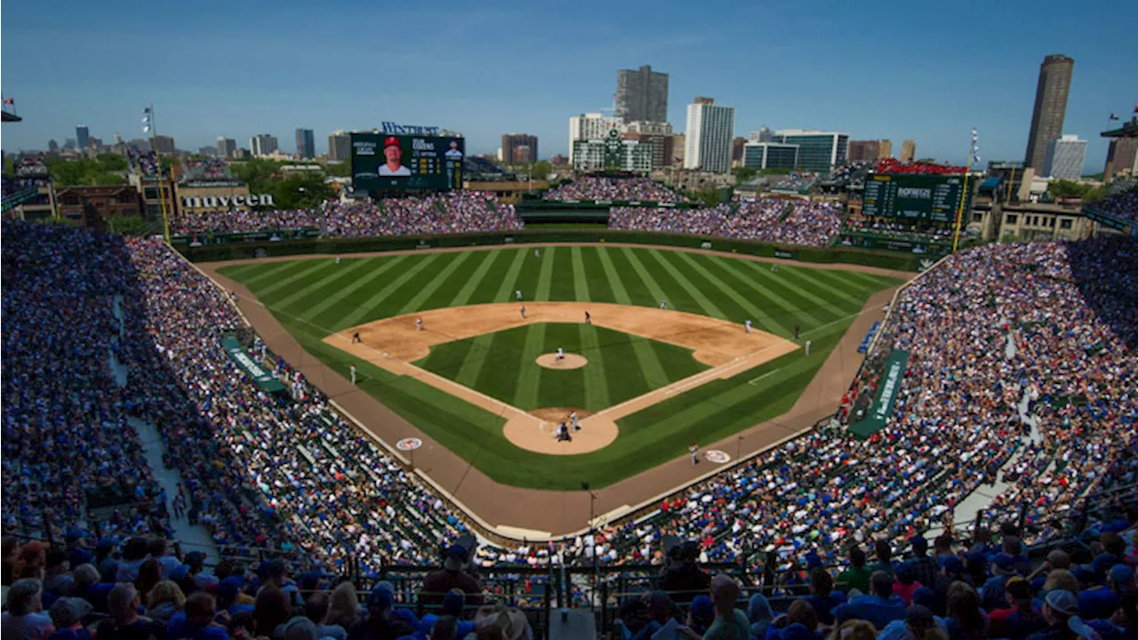 Cubs rounding the bases to install new rooftop signs on buildings around Wrigley