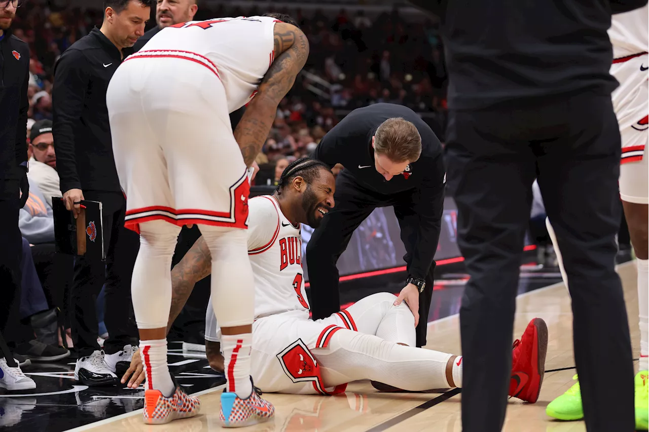 Bulls' Andre Drummond wheeled off court following bizarre dunk attempt