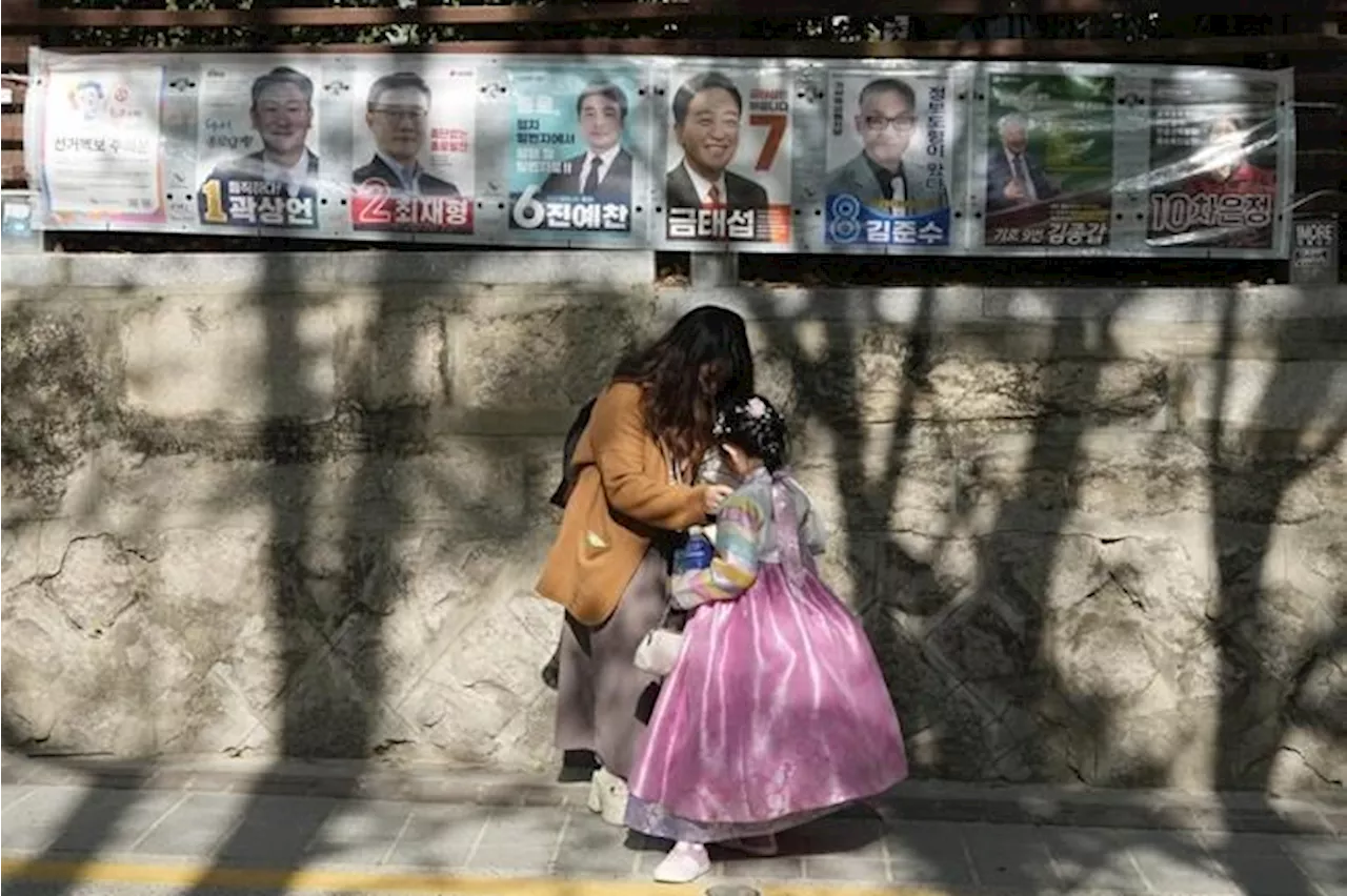 Exit polls suggest a big win by South Korea’s liberal opposition parties in parliamentary election