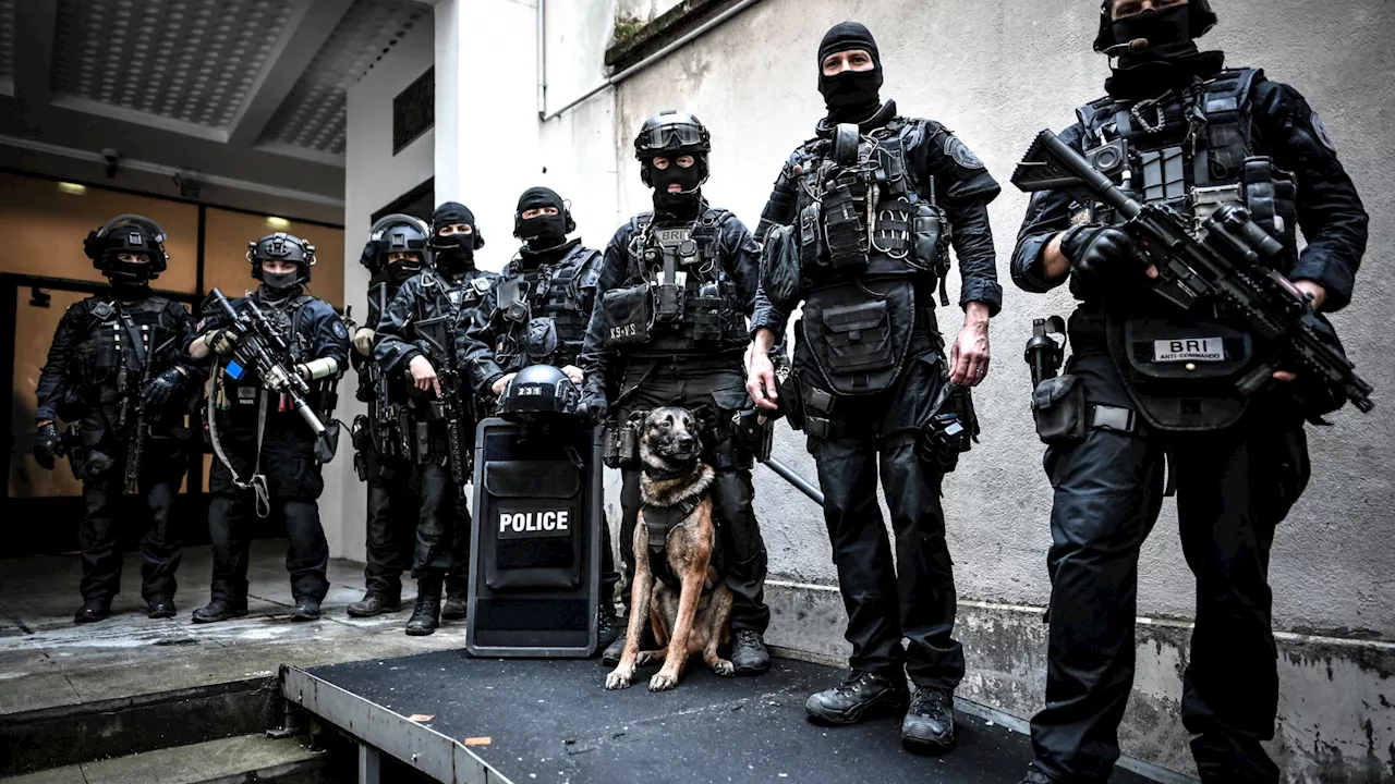 Top anti-terror unit packing shotguns & battering rams deployed to PSG v Barcelona Champions League QF...