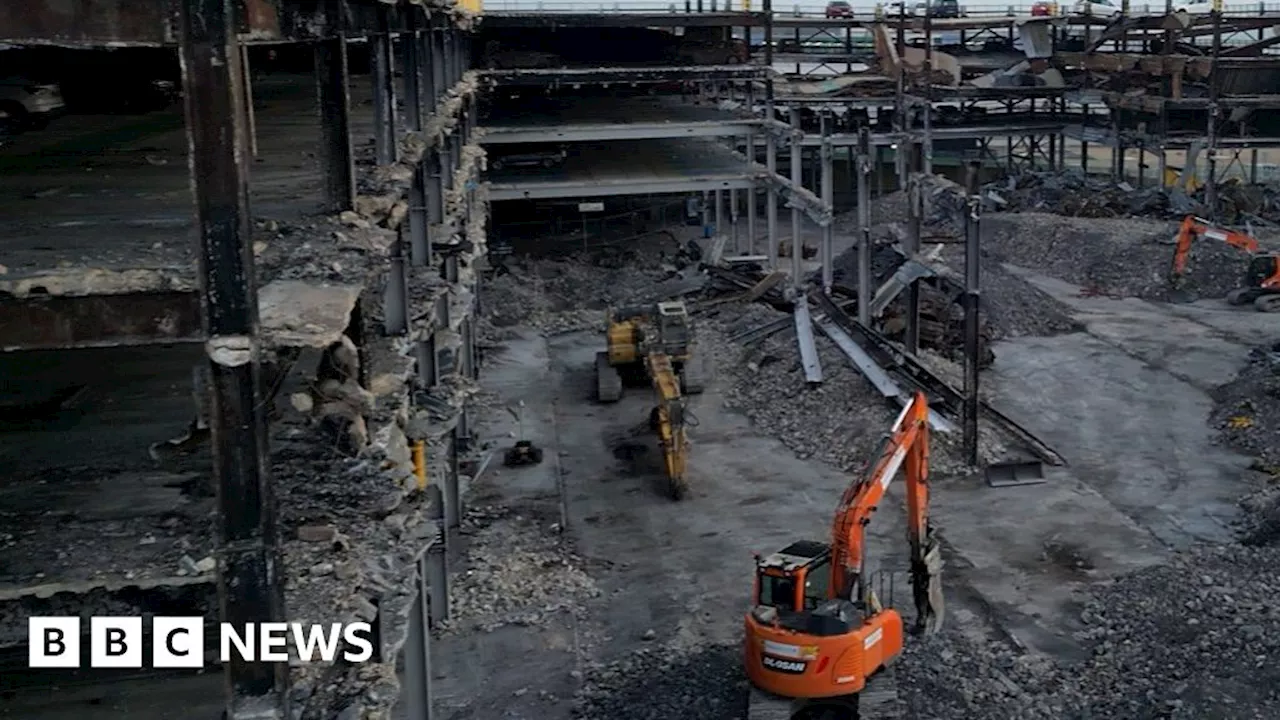 Drone films burned-out Luton Airport car park's demolition