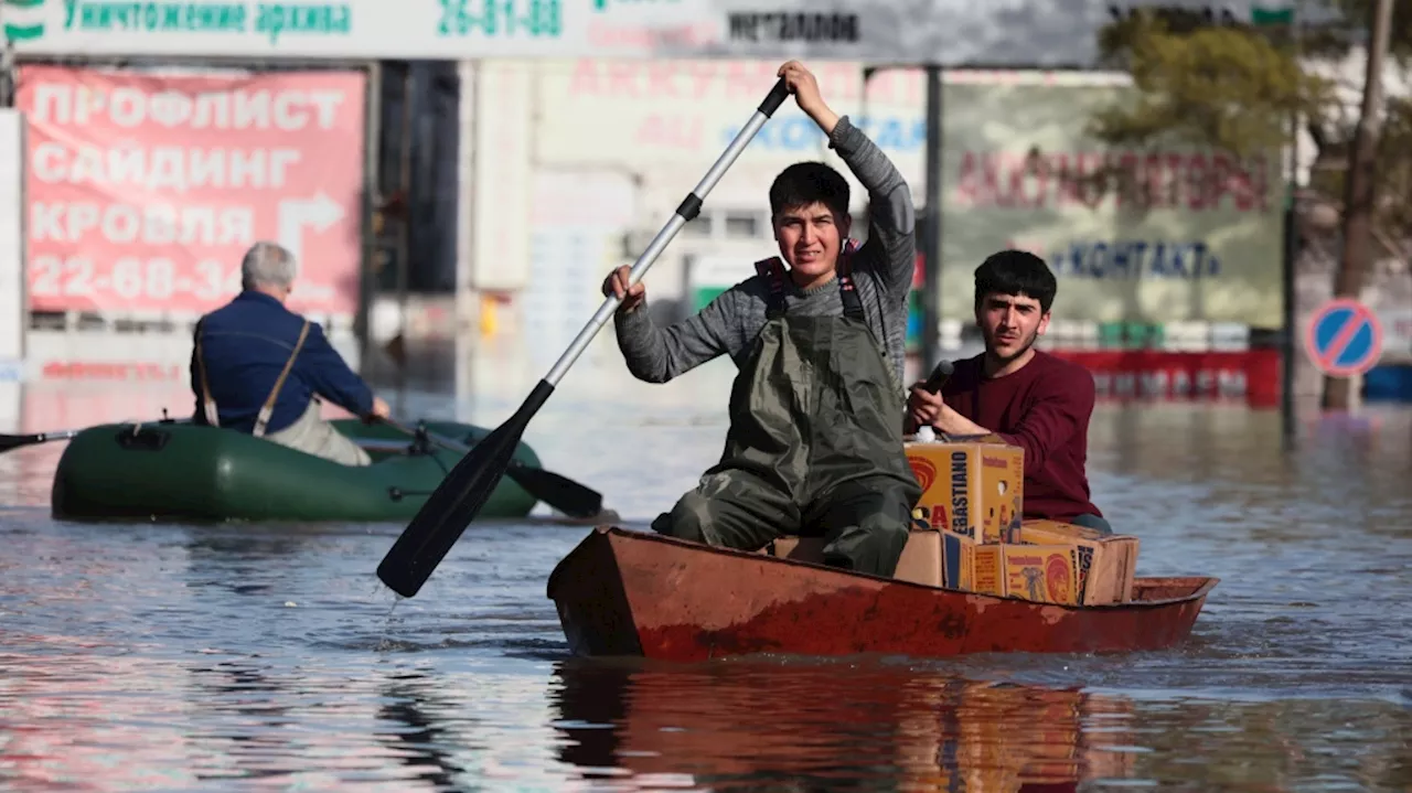 Nearly 12,000 homes are flooded in a Russian region bordering Kazakhstan as water levels keep rising