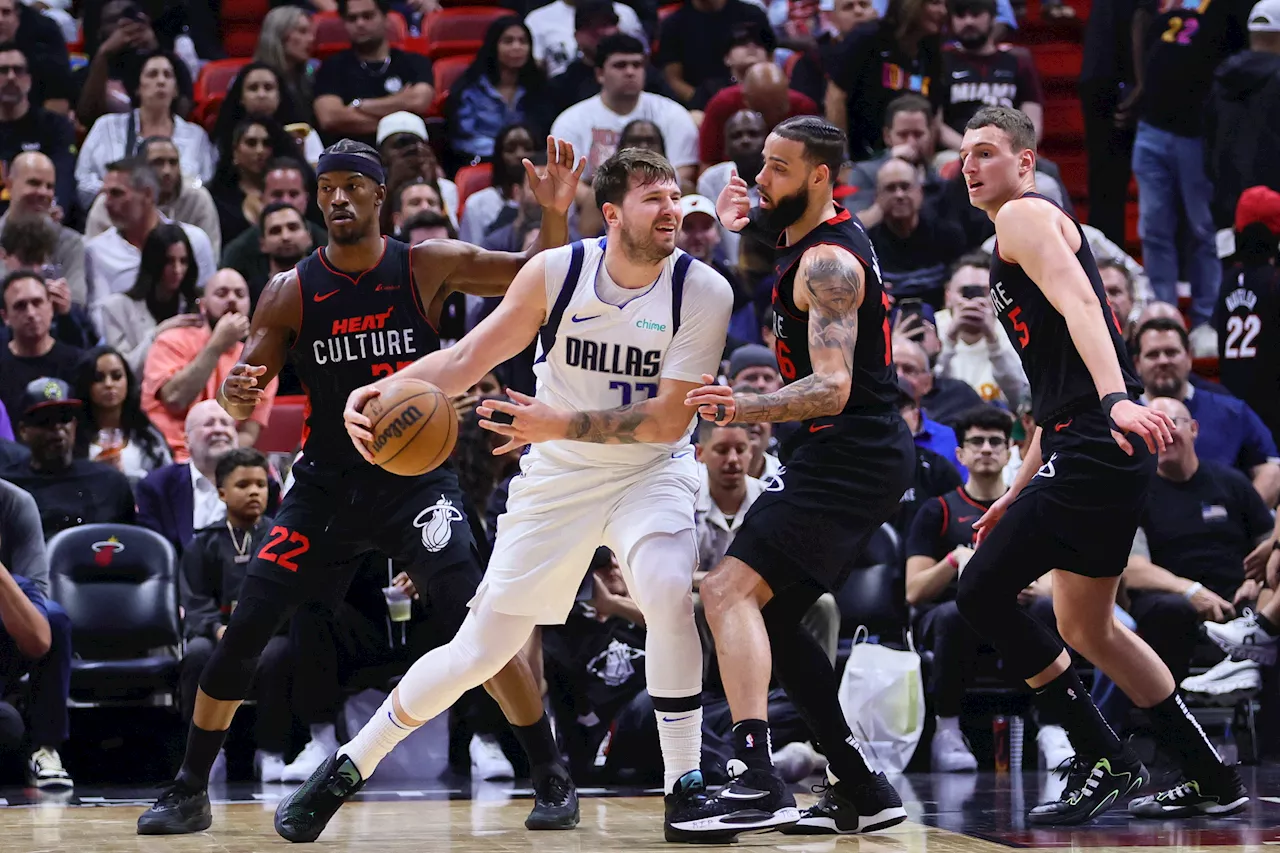 NBA: Mavs continue torrid stretch, rough up Heat