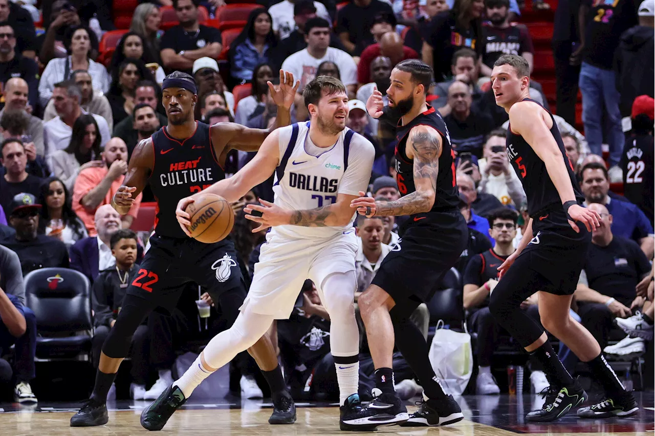 Luka Doncic and Kyrie Irving lead Dallas Mavericks to victory over Miami Heat