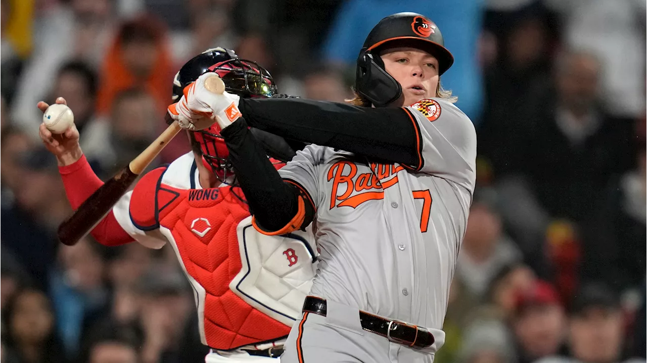 Orioles rally from five down to beat Red Sox in Holliday's debut