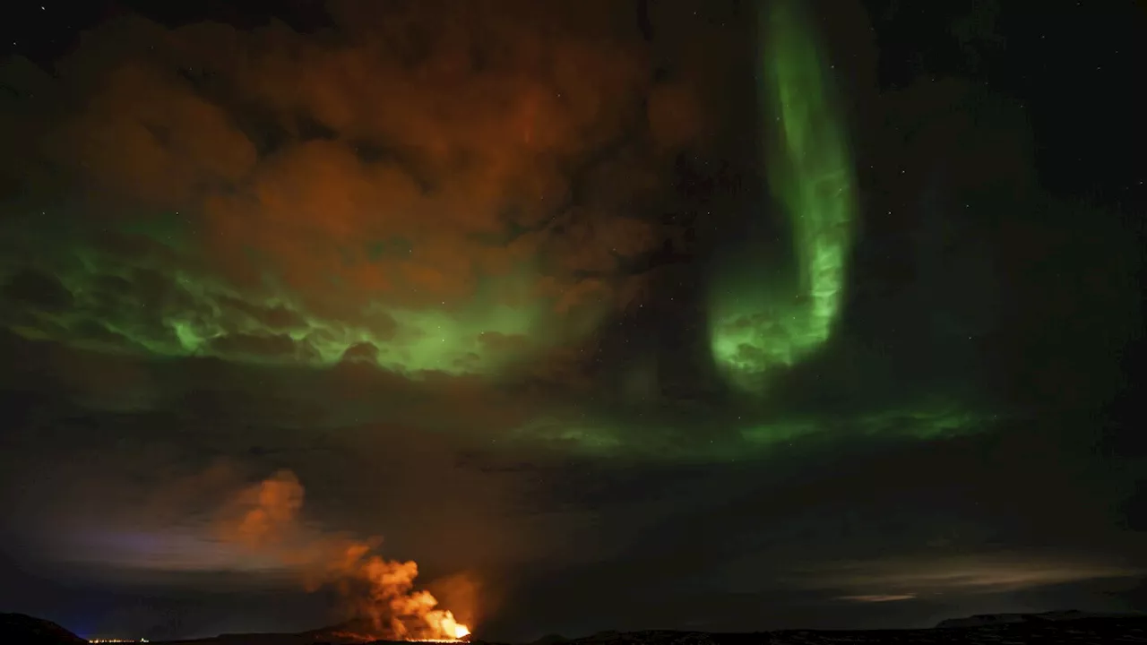 Northern Lights Illuminate Eruption Area in Iceland