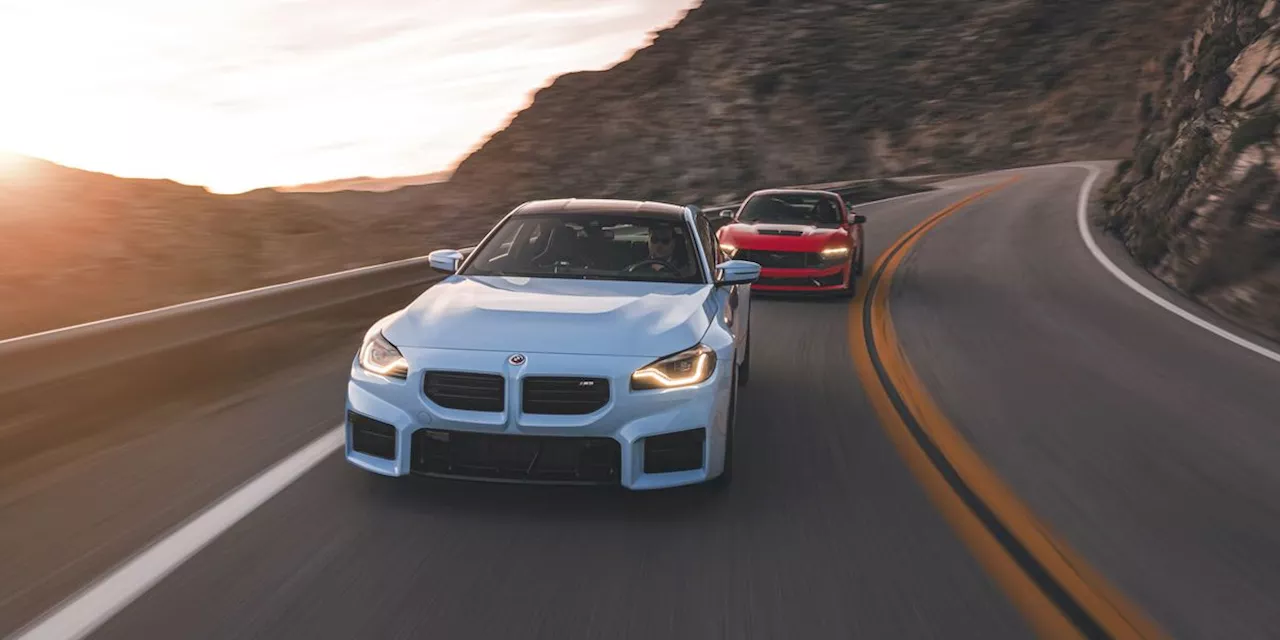 View Photos of the 2023 BMW M2 vs. 2024 Ford Mustang Dark Horse