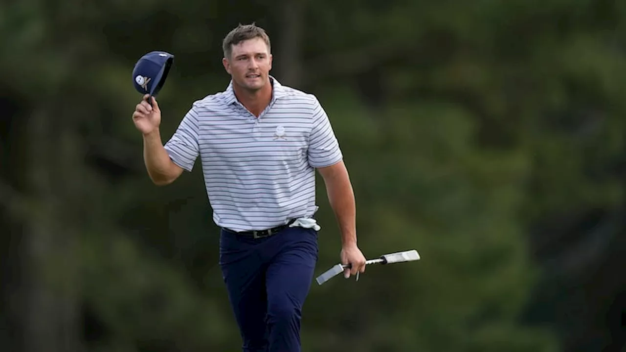 Bryson DeChambeau puts on a Masters clinic, leads Scottie Scheffler