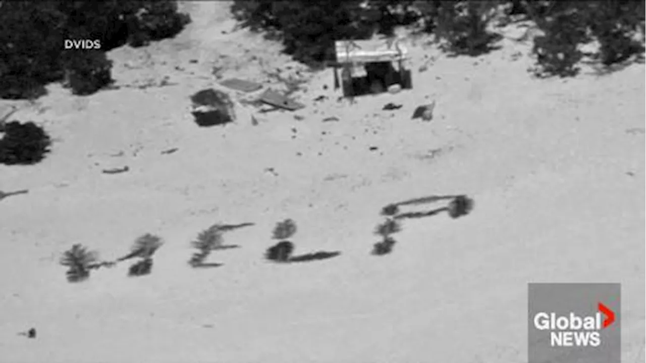 Castaways rescued from deserted island after making ‘HELP’ sign with palm leaves