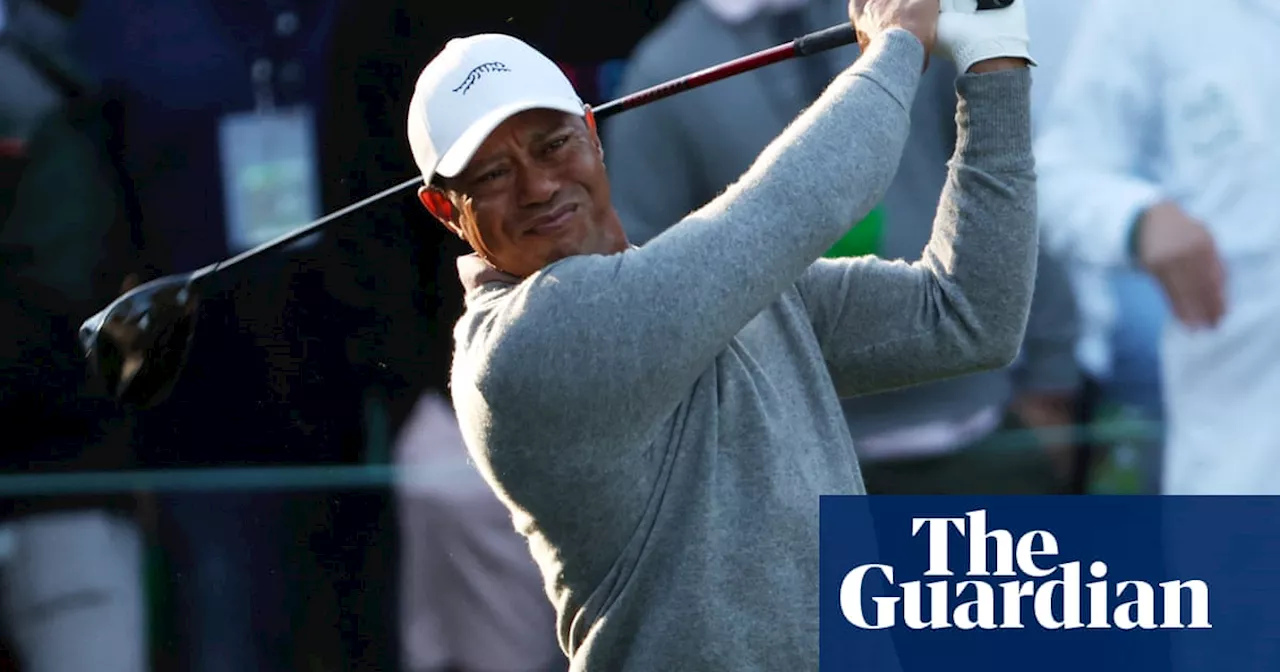 Wincing Tiger Woods endures his marathon to make Masters history