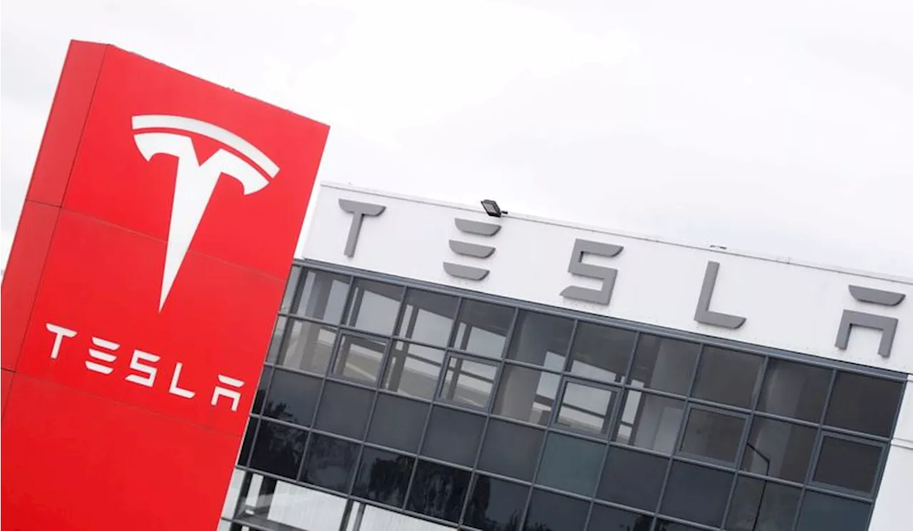 Citi cuts Tesla stock target, urges investors to be patient