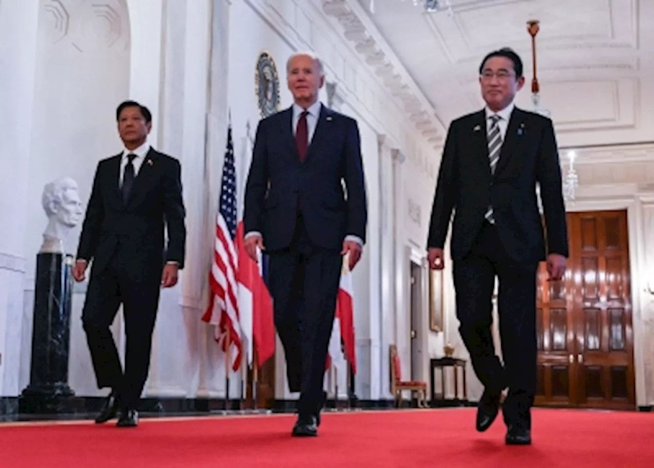 Biden vows ‘ironclad’ defence of Philippines, Japan as China tension mounts