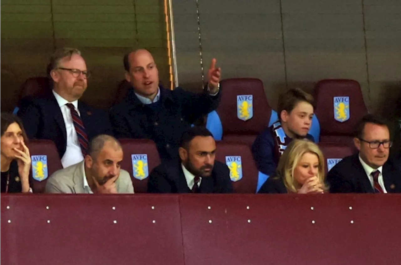 Football-mad Prince William and Prince George spotted cheering on their beloved Aston Villa