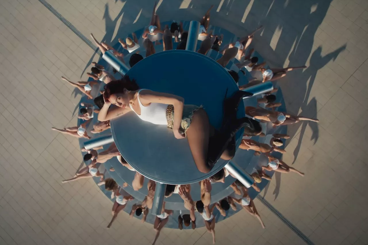 Dua Lipa Climbs a Tower of Men in 'Illusion' Music Video: Watch